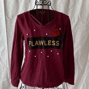 Girl’s long sleeve shirt.